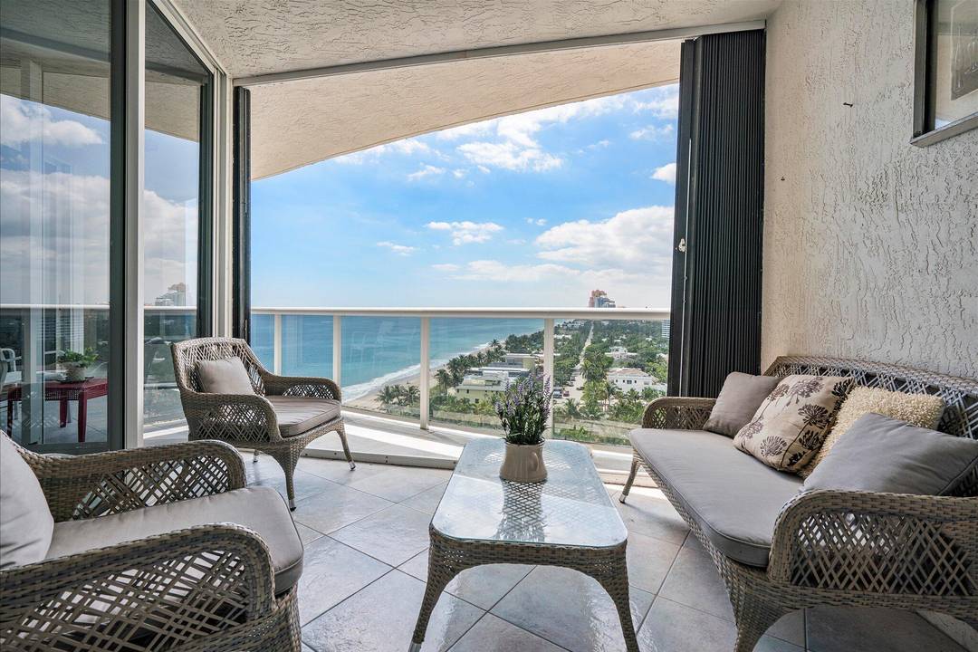 Magnificent Southeast ocean and L'Hermitage resort views from this furnished, 2 BR 2 Bath.