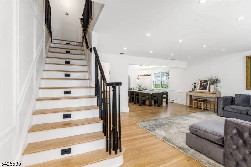 Welcome to the epitome of refined living on a beautiful block !