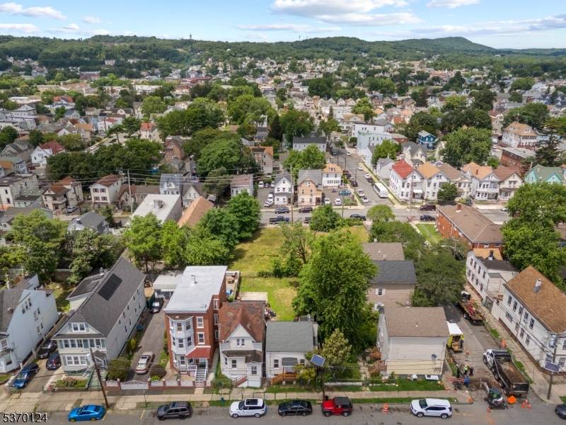 Spacious and well kept 3 bedroom, 2 bath single family home with private backyard in a central Paterson location.