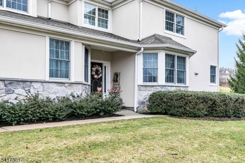 Discover the epitome of luxury living in this fantastic 3 bedroom townhome in the prestigious Amherst Mews development, offering breathtaking views overlooking the NJ National Golf Club.