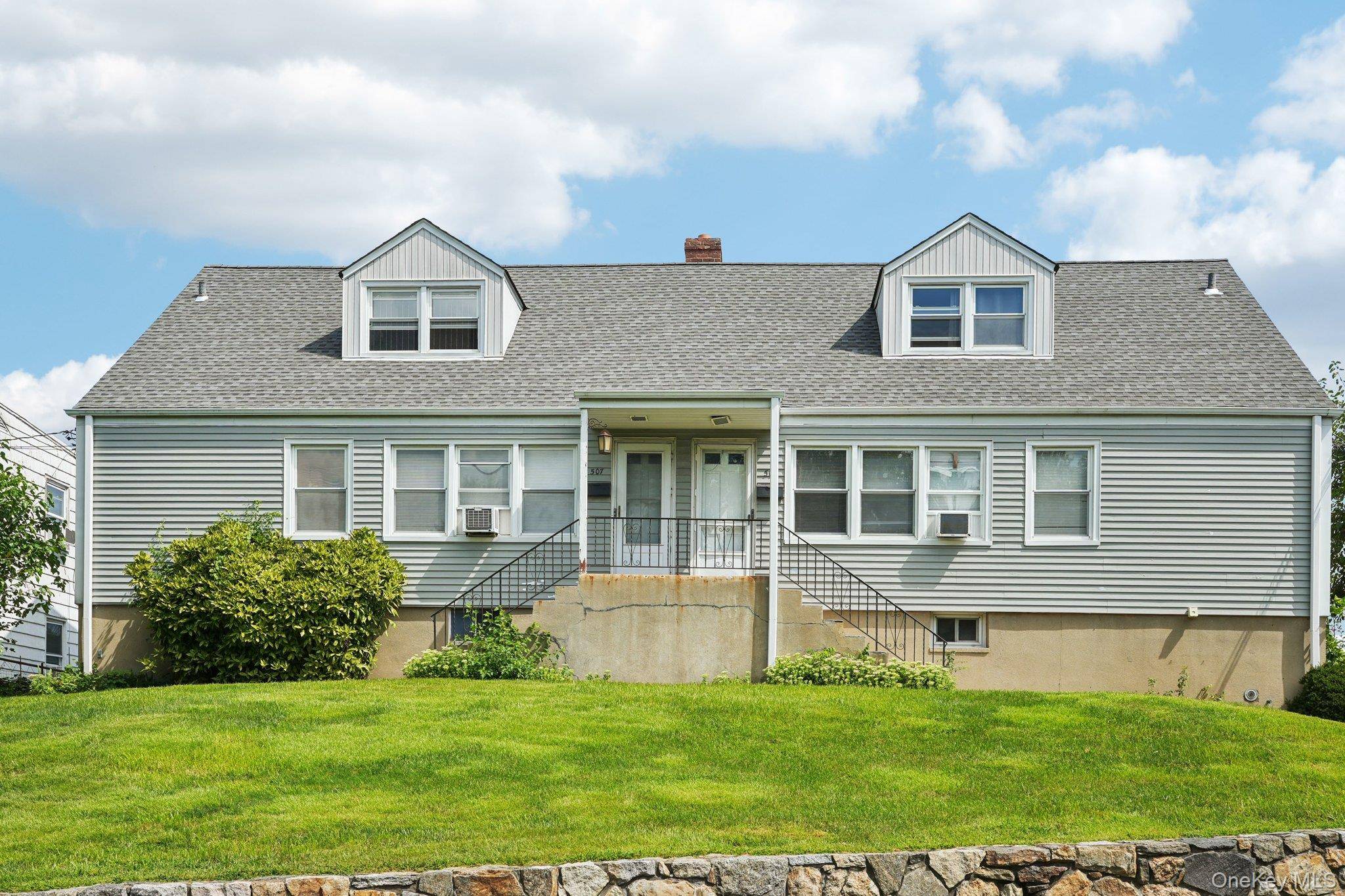 A rare opportunity to own a centrally located 4 unit multi family with 2 separate full walk out basements and parking in the village of Mamaroneck.