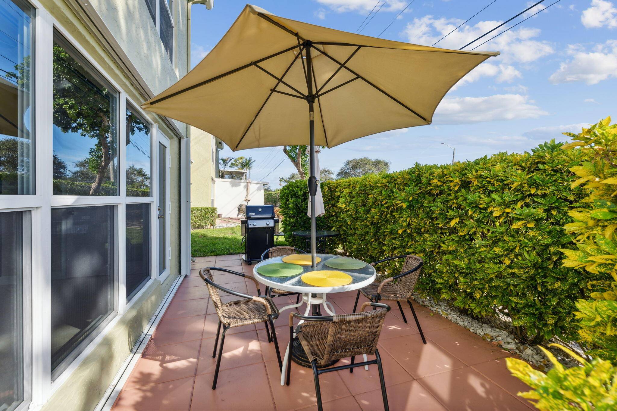 Welcome to easy living in this beautifully maintained 2 bedroom, 2 bathroom ground floor condo, perfectly situated in a vibrant 55 active adult community.