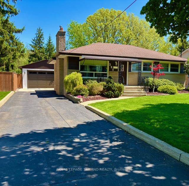 Impressive beautifully renovated 2024 3 bedroom 2 full bath bungalow in a wonderful neighbourhood backing onto Southcrest Ravine.