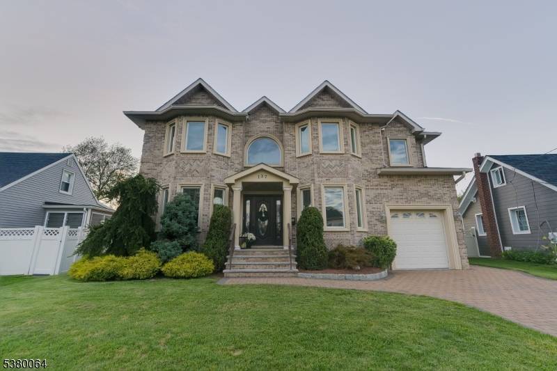 This stunning Center Hall Colonial offers the perfect blend of classic charm and modern luxury, located in a quiet neighborhood close to parks and conveniently located within walking distance to ...