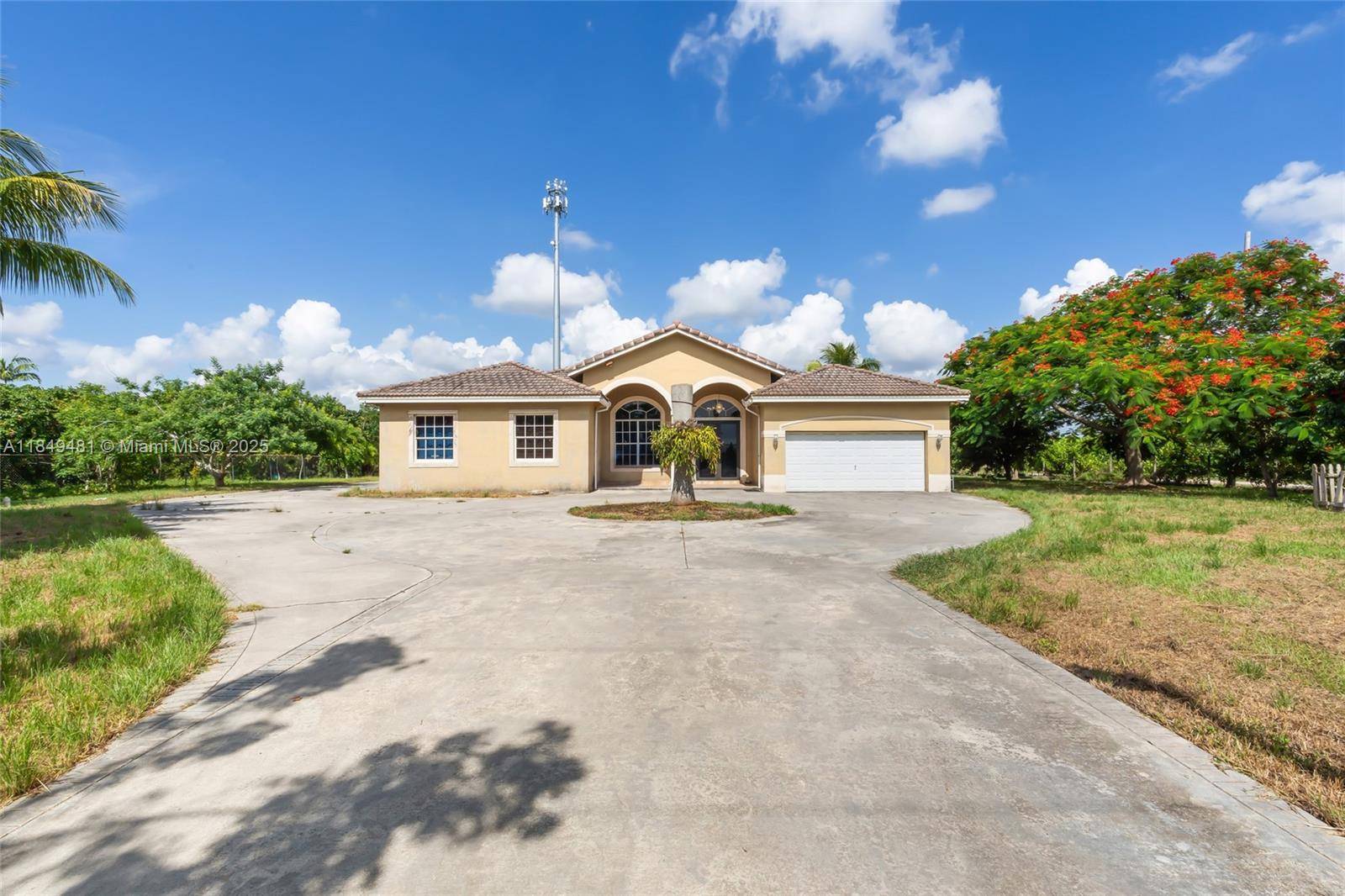 Escape to your own private paradise in this stunning 4 bedroom, 3 bath residence, offering 2, 445 sq.