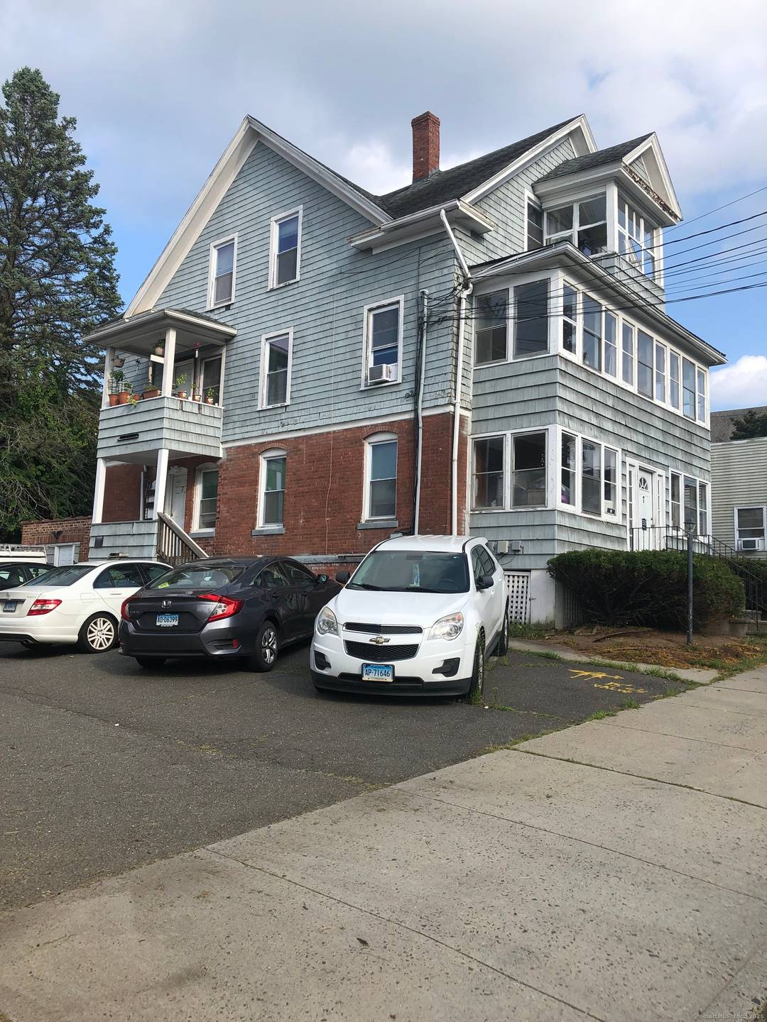 Fully Leased Three Family.