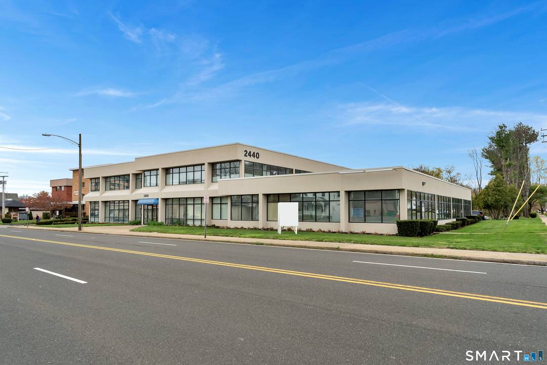 Incredible opportunity to own a 25, 000 SQ FT two story office building on Whitney Ave in the Heart of Hamden on large 1.