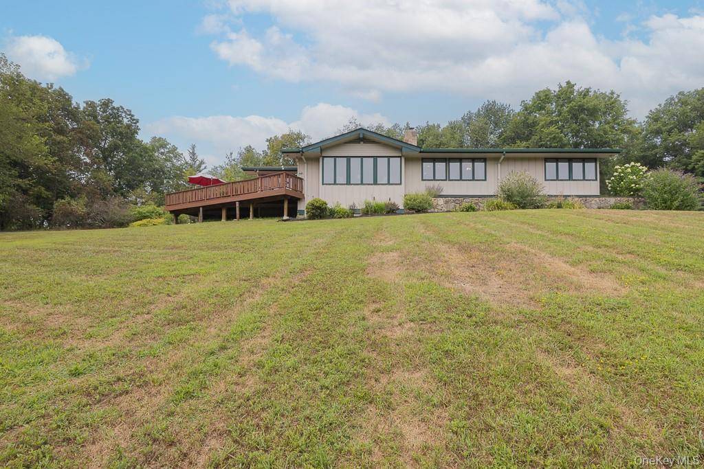 Escape to a world where architectural brilliance meets tranquil seclusion at 206 Hoslers Road.