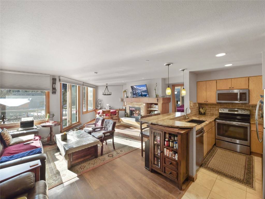 This oversized and beautifully remodeled one bedroom, two bathroom condo not only offers breathtaking views overlooking Keystone Lake but also presents an incredible chance for solid rental income.