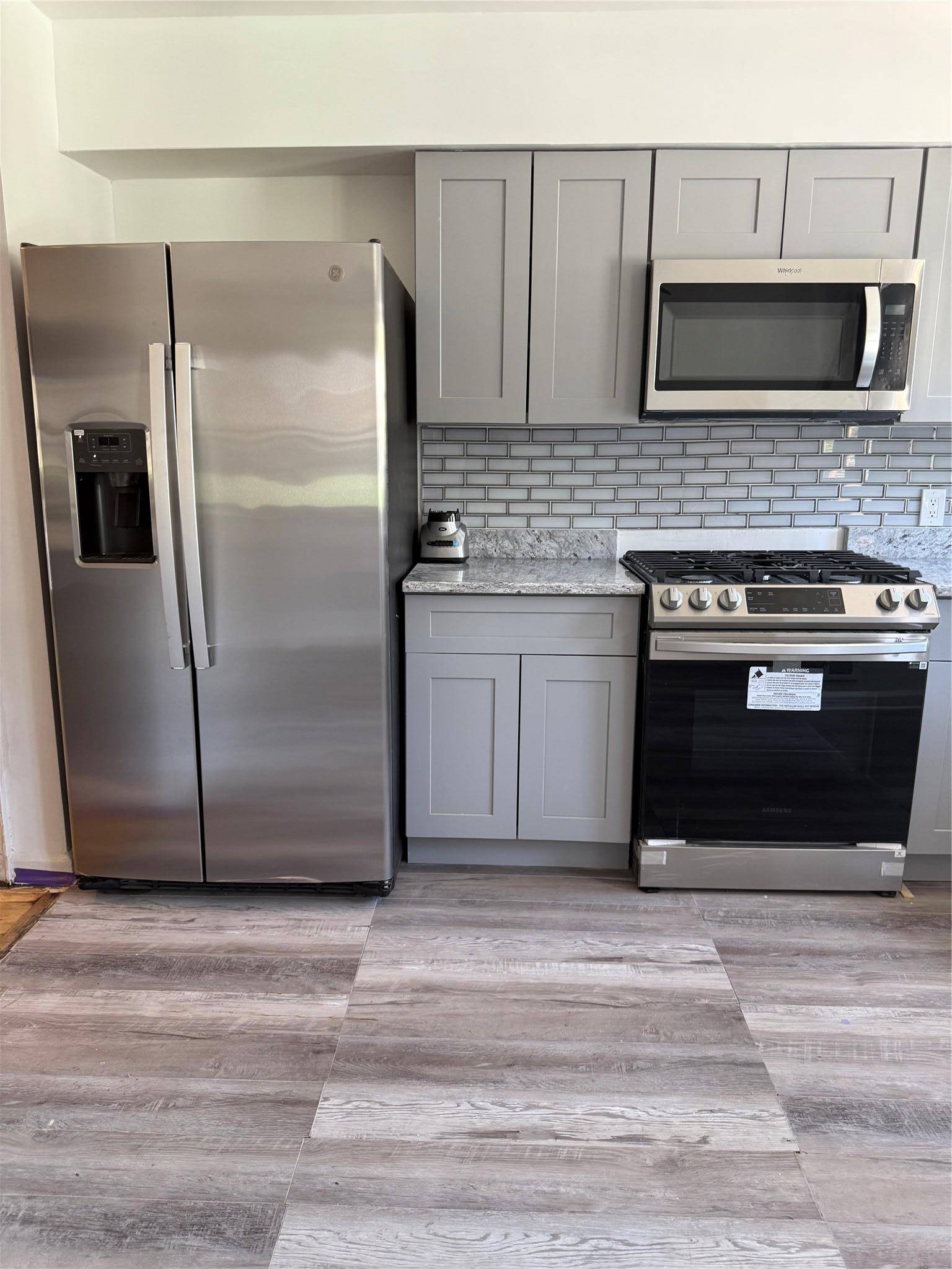 Lovely 3 bedroom 1. 5 bath solid brick home with a private driveway, over sized one car garage.