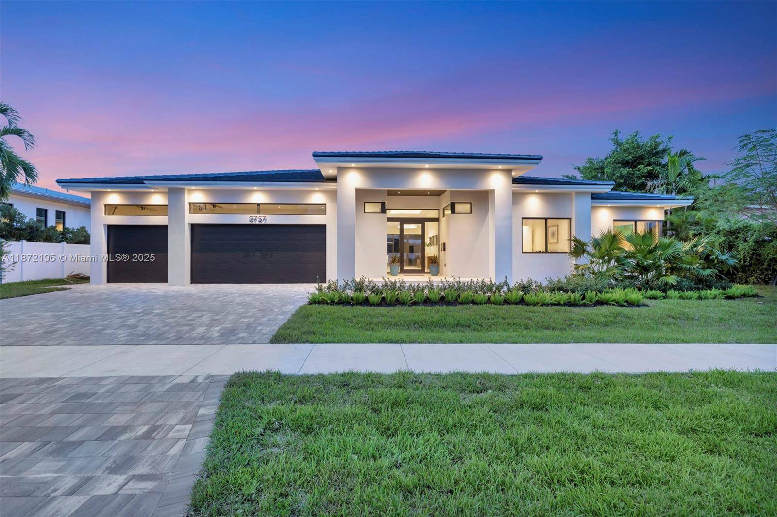 Discover a newly completed custom estate in Coral Ridge Country Club Estates, masterfully designed for both elegance amp ; ease of living.