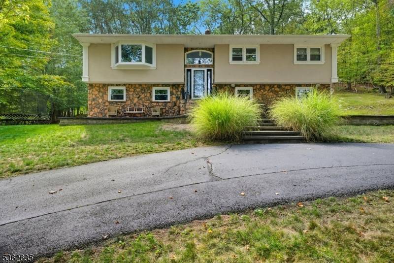 Welcome to 11 Glenbourne Drive in desirable Boonton Township, a beautifully maintained home offering generous living space and versatility.