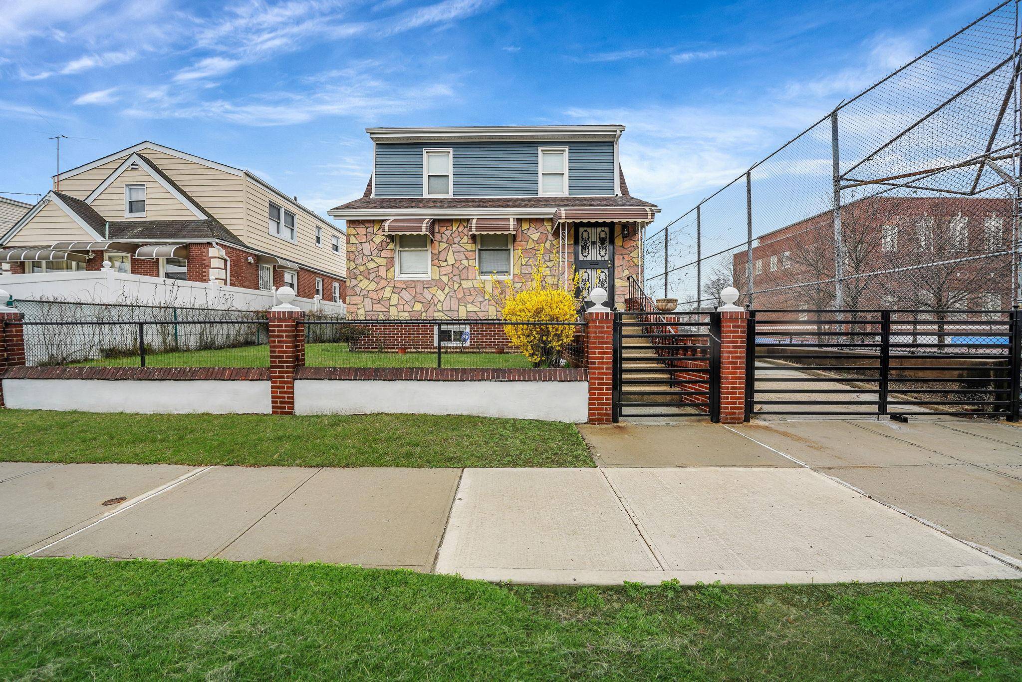 Welcome to 218 36 132nd Ave a spacious two family home offering incredible potential !