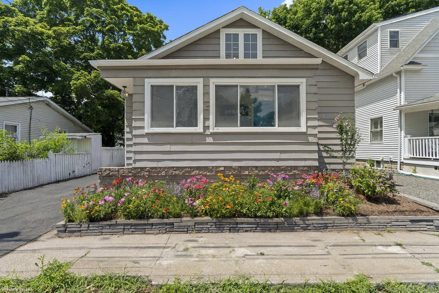 Tucked into one of Milford's most beloved coastal neighborhoods, this updated bungalow offers comfort, flexibility, and an unbeatable location just a short stroll to Fort Trumbull Beach.