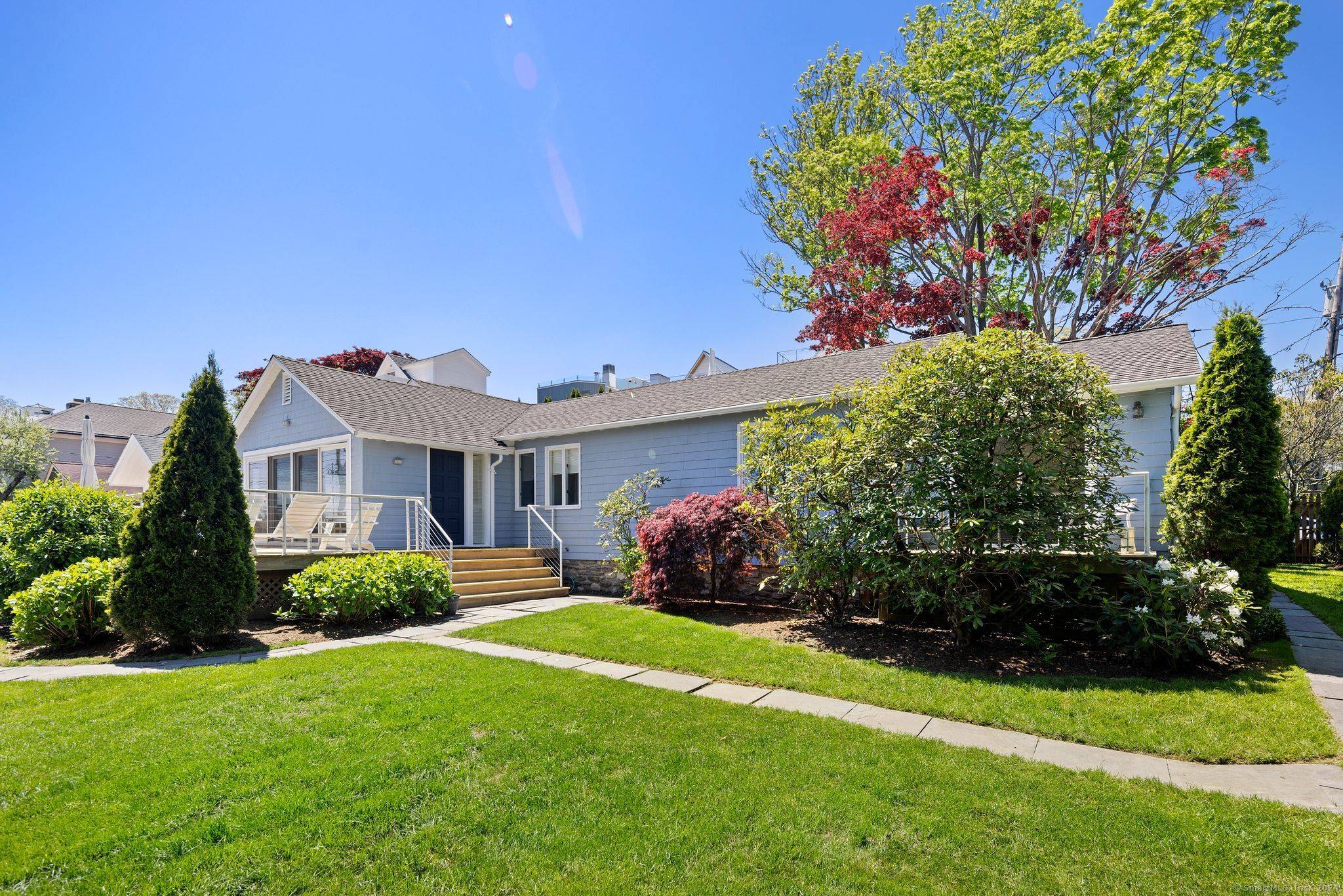 Light, bright Contemporary Ranch with incredible water views of the LI Sound.
