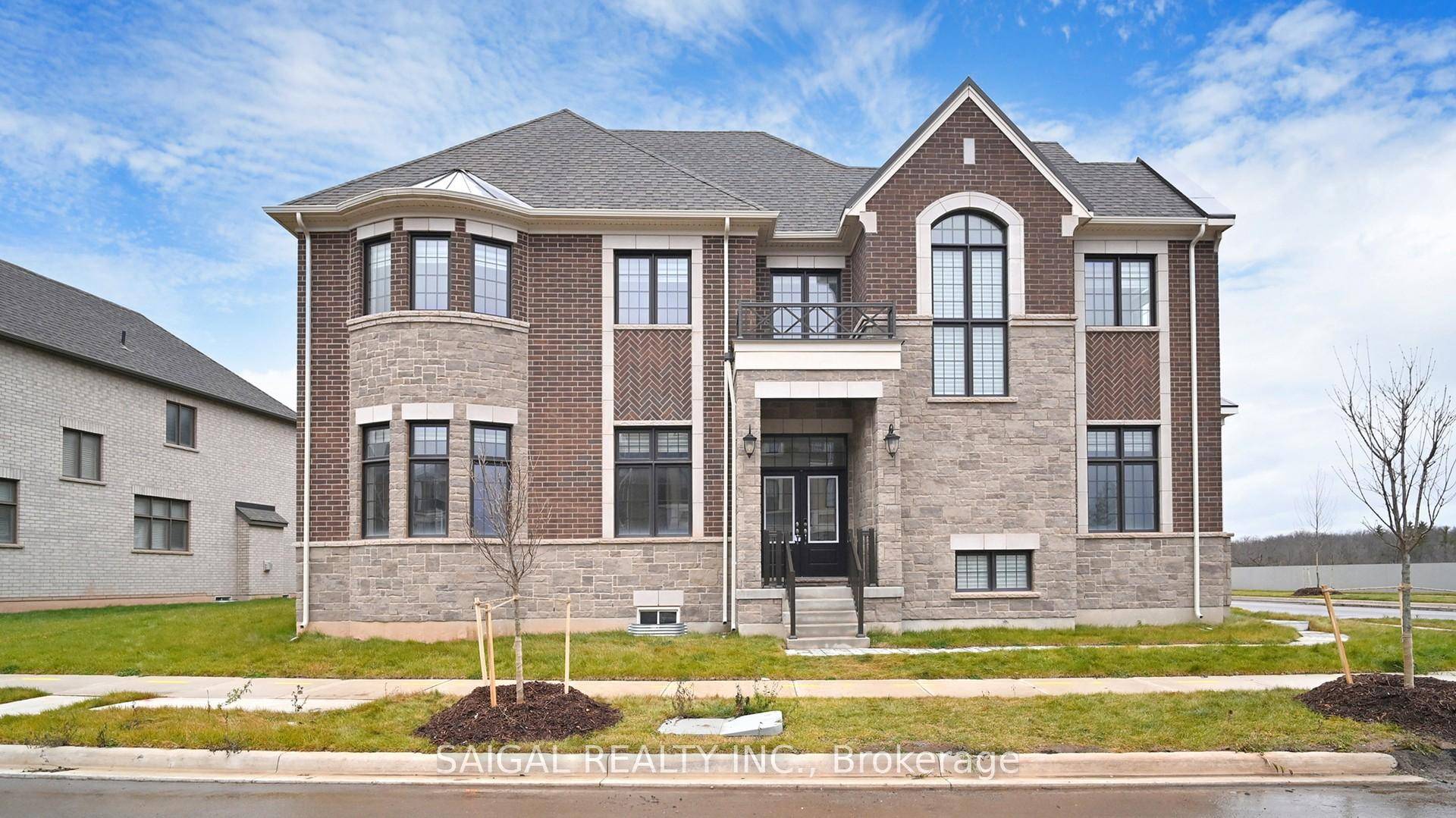 Mattamy Brookdale Corner Welcomes You With Its Charming Portico, Leading Into A Foyer Adorned By A Grand Staircase To The Right.