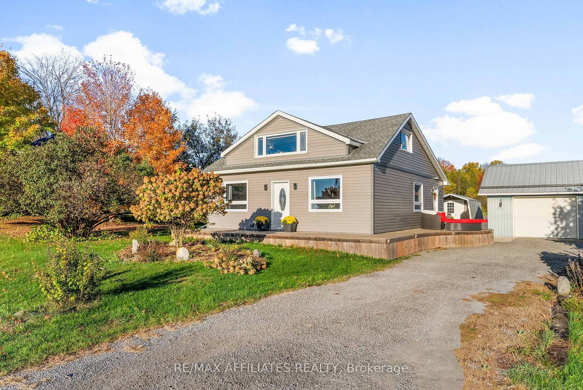 Picturesque property just outside of Spencerville, this extraordinary 1 1 2 storey home redefines rural living.