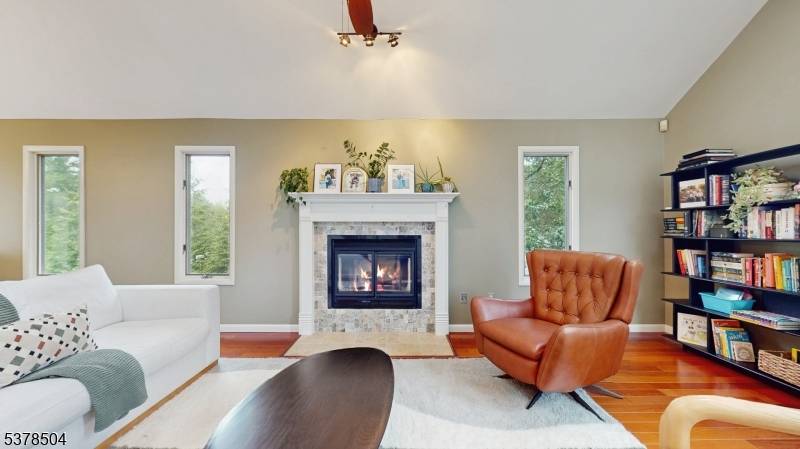 Soaring cathedral ceilings in the living and dining rooms elevate the already spacious feel of this beautifully maintained 4 bedroom, 2.