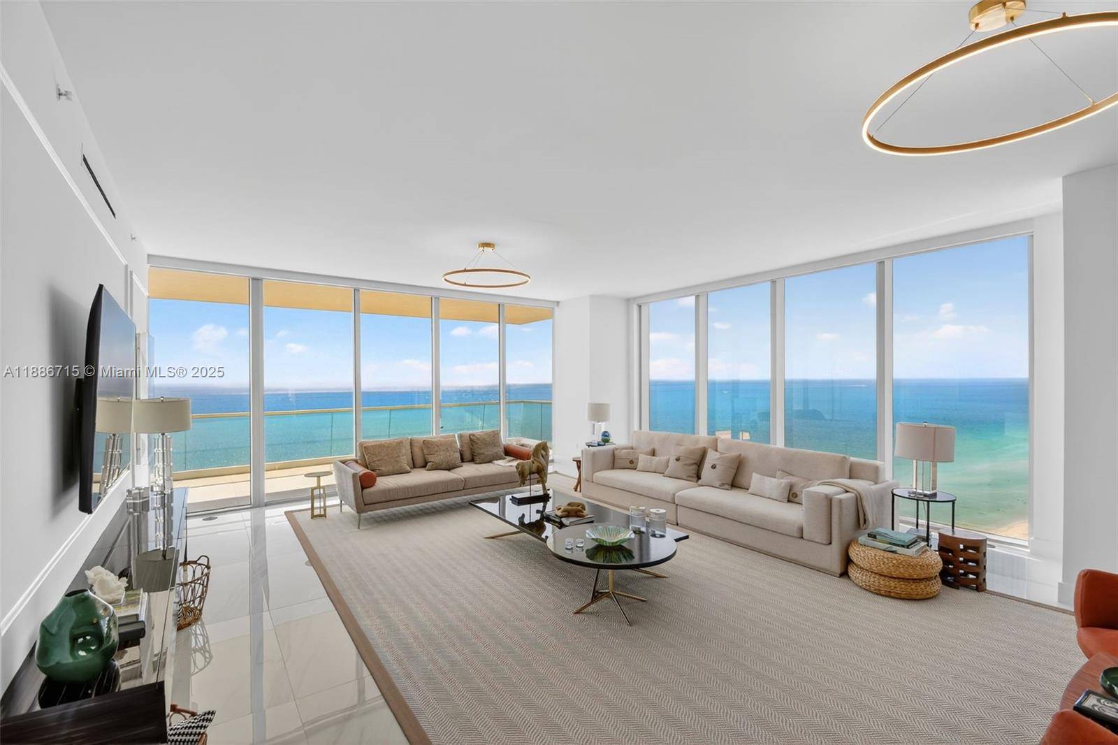 Experience unrivaled luxury in this spectacular, fully furnished, oceanfront corner residence at Turnberry Ocean Club in Sunny Isles Beach.