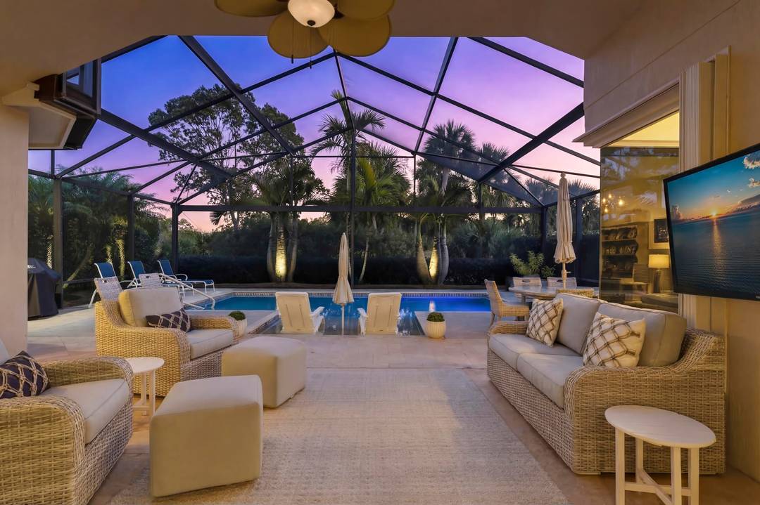 Welcome to this beautifully updated single family residence in the highly sought after community of Jupiter Country Club.