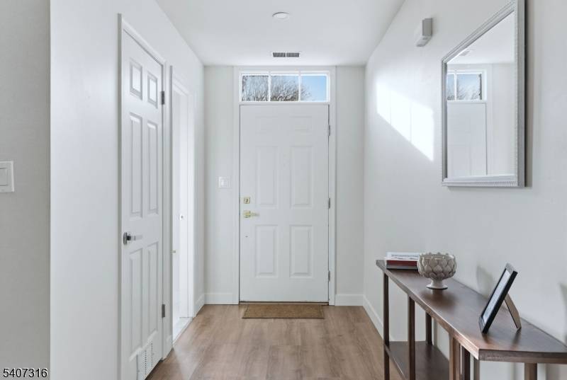 Welcome to 71 Washington Court a beautifully updated townhouse tucked within the highly desirable Jade Mountain Community in Towaco.