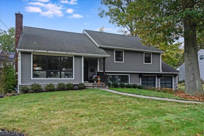 Welcome to this uniquely expanded split level home offering the perfect blend of space, style, and modern comfort.