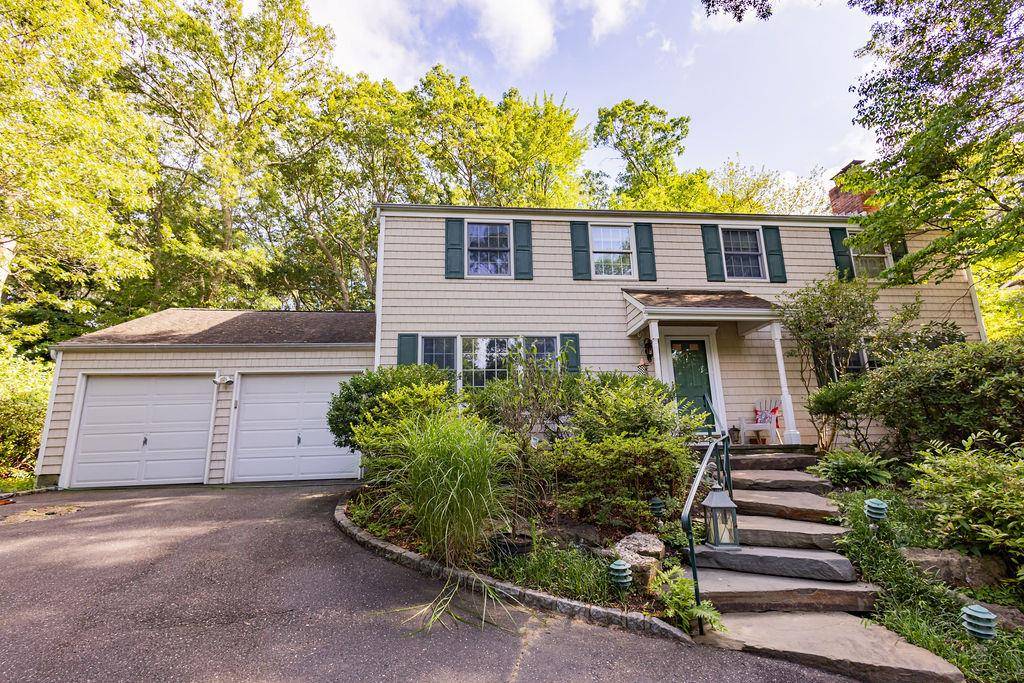 Welcome to this beautifully updated Colonial in the heart of Setauket.