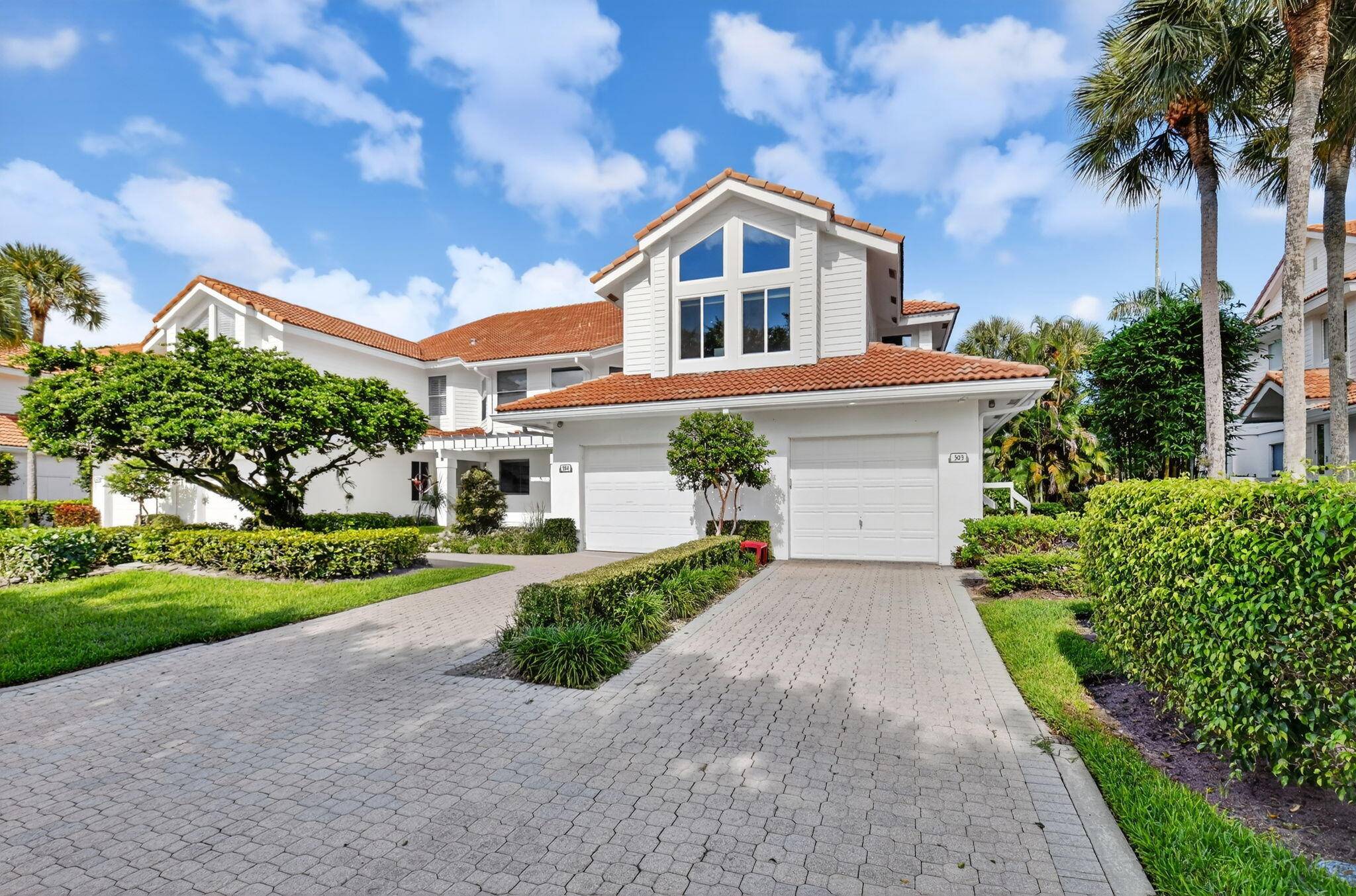 Experience luxury in this renovated 2nd floor penthouse located in the desirable village of Clubside Pointe in Broken Sound Country Club.