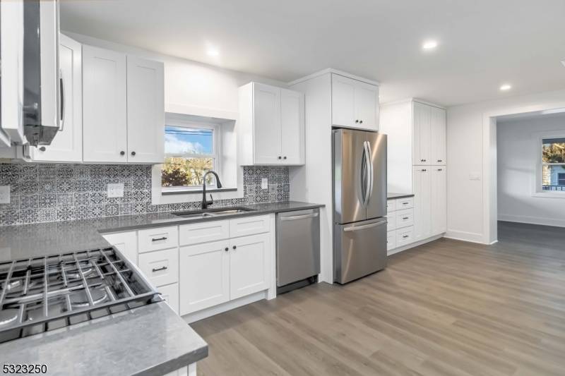 Welcome to this COMPLETELY RENOVATED Duplex unit featuring 3 spacious bedrooms and 2.