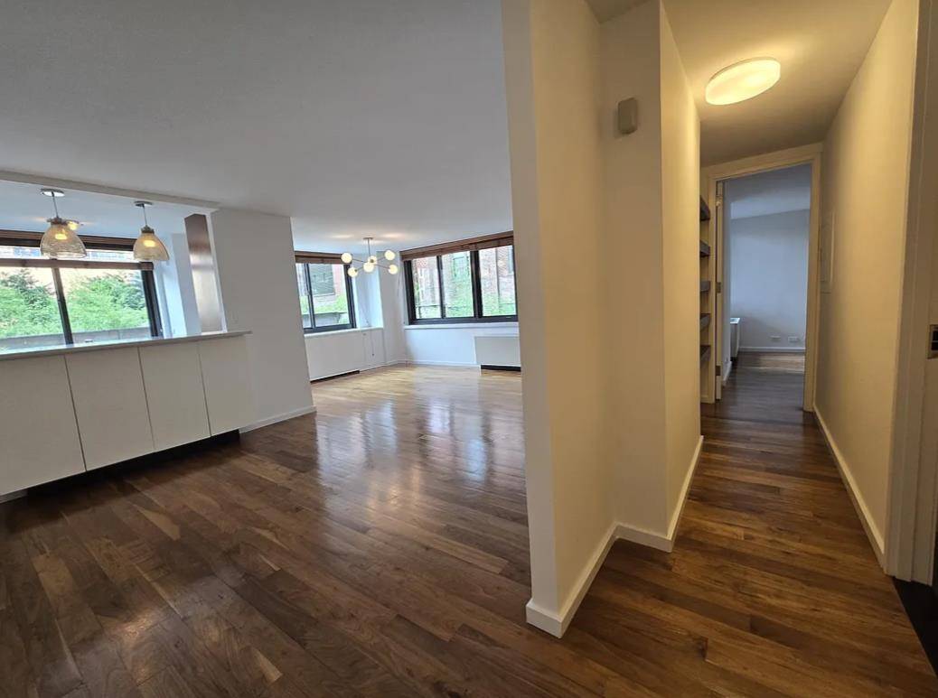 High end open layout split 2 bedroom with formal dining area and open Kitchen bar height counter.