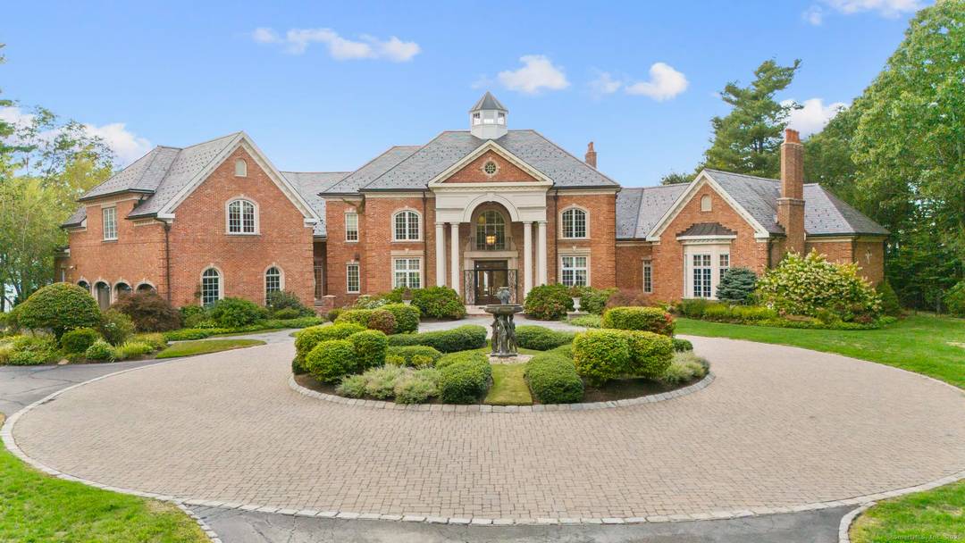 Luxury at its finest Views, Privacy Prominence in this prestigious European inspired gated estate anchoring this sought after cul de sac community.