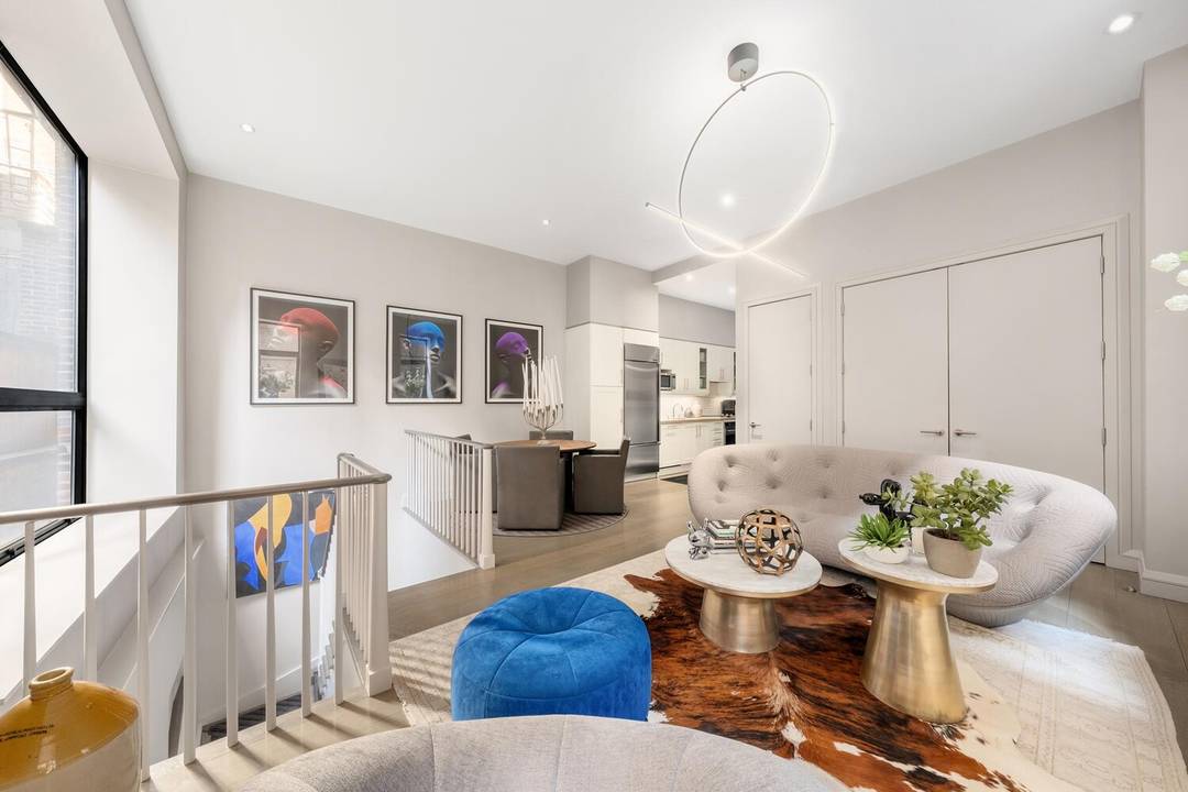 An uncommon level of sophistication will be experienced in this Chelsea Duplex Loft at the Carriage House, a boutique condominium, with an INDOOR PRIVATE PARKING SPACE INCLUDED !
