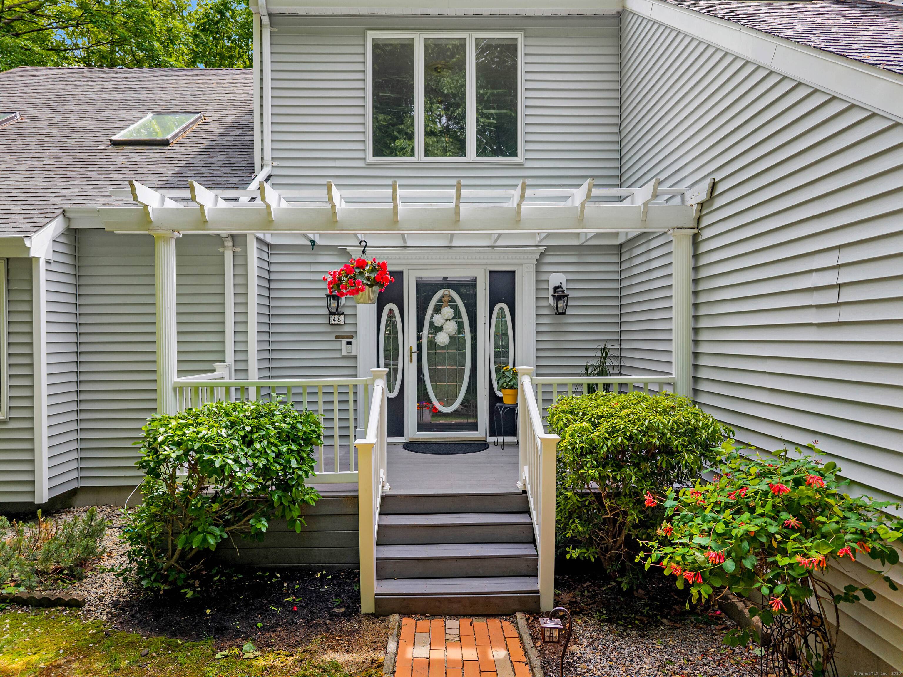 This one of a kind Contemporary Colonial home features 4 bedrooms, 2.