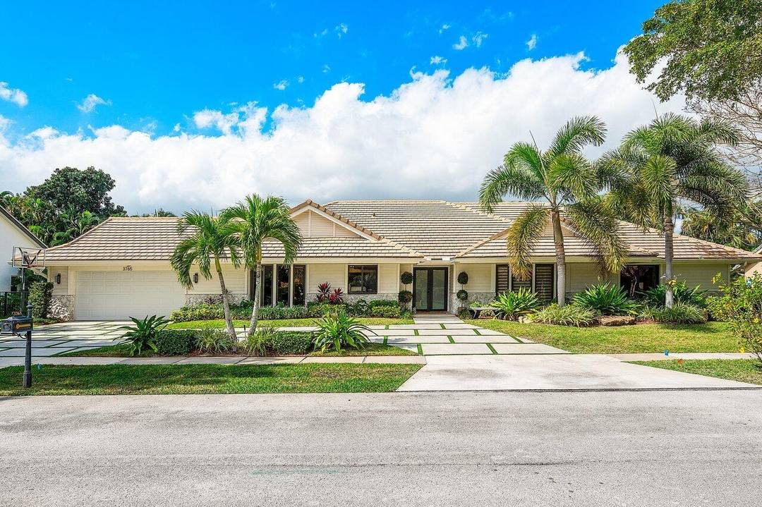Welcome to Woodfield Hunt Club, a sought after gated community in central Boca with no mandatory membership.