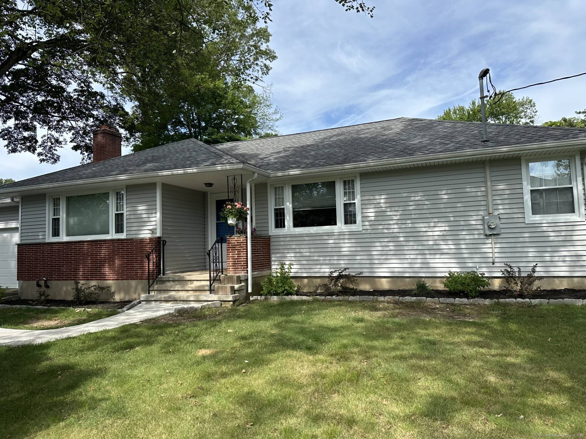 Nestled on a private, professionally landscaped corner lot in Trumbull's desirable Long Hill neighborhood, this charming ranch offers the perfect mix of tranquility and convenience.