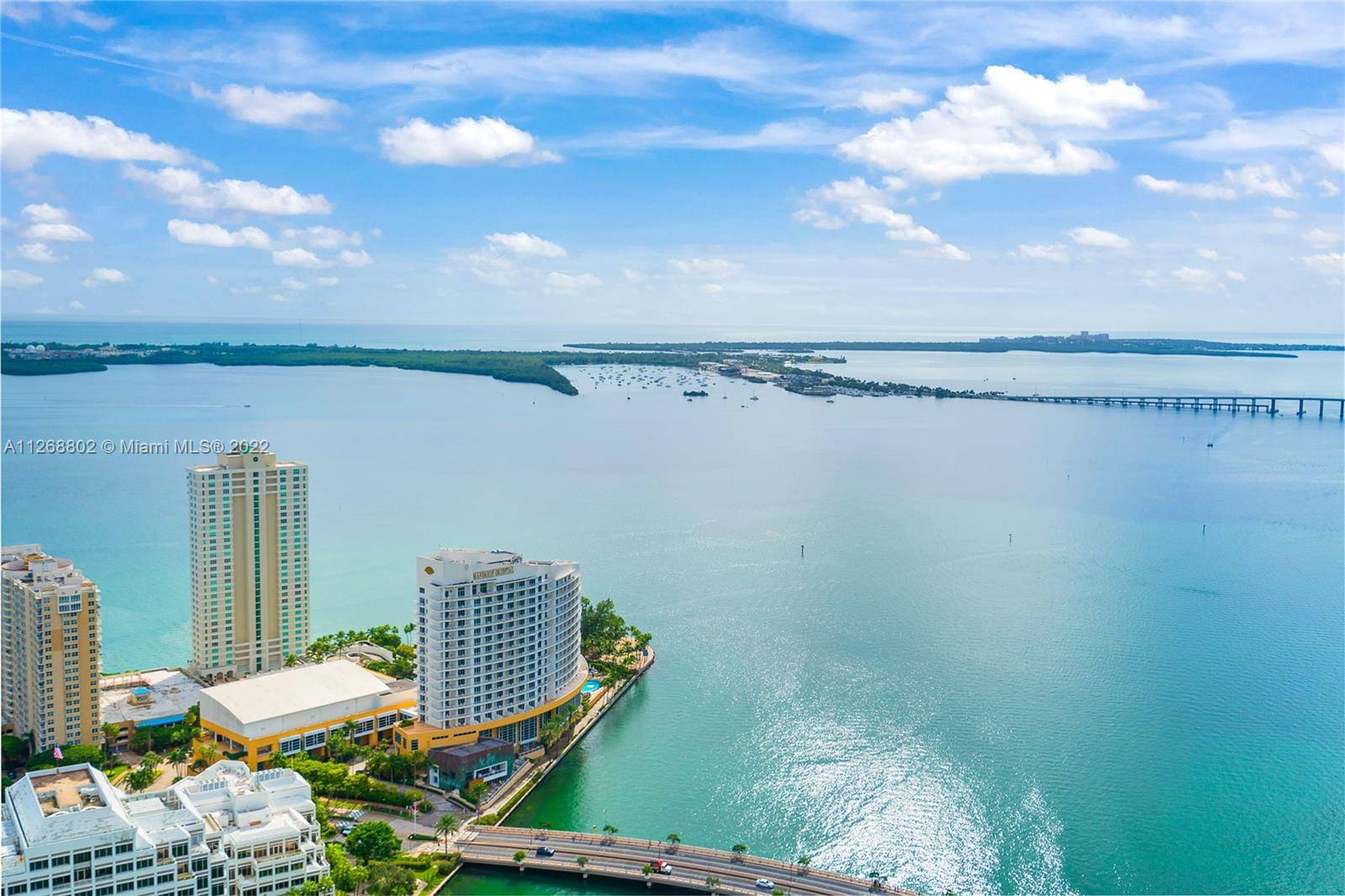 Breathtaking views of Biscayne Bay, Key Biscayne beyond from the 30th floor of Icon Brickell, Tower II.