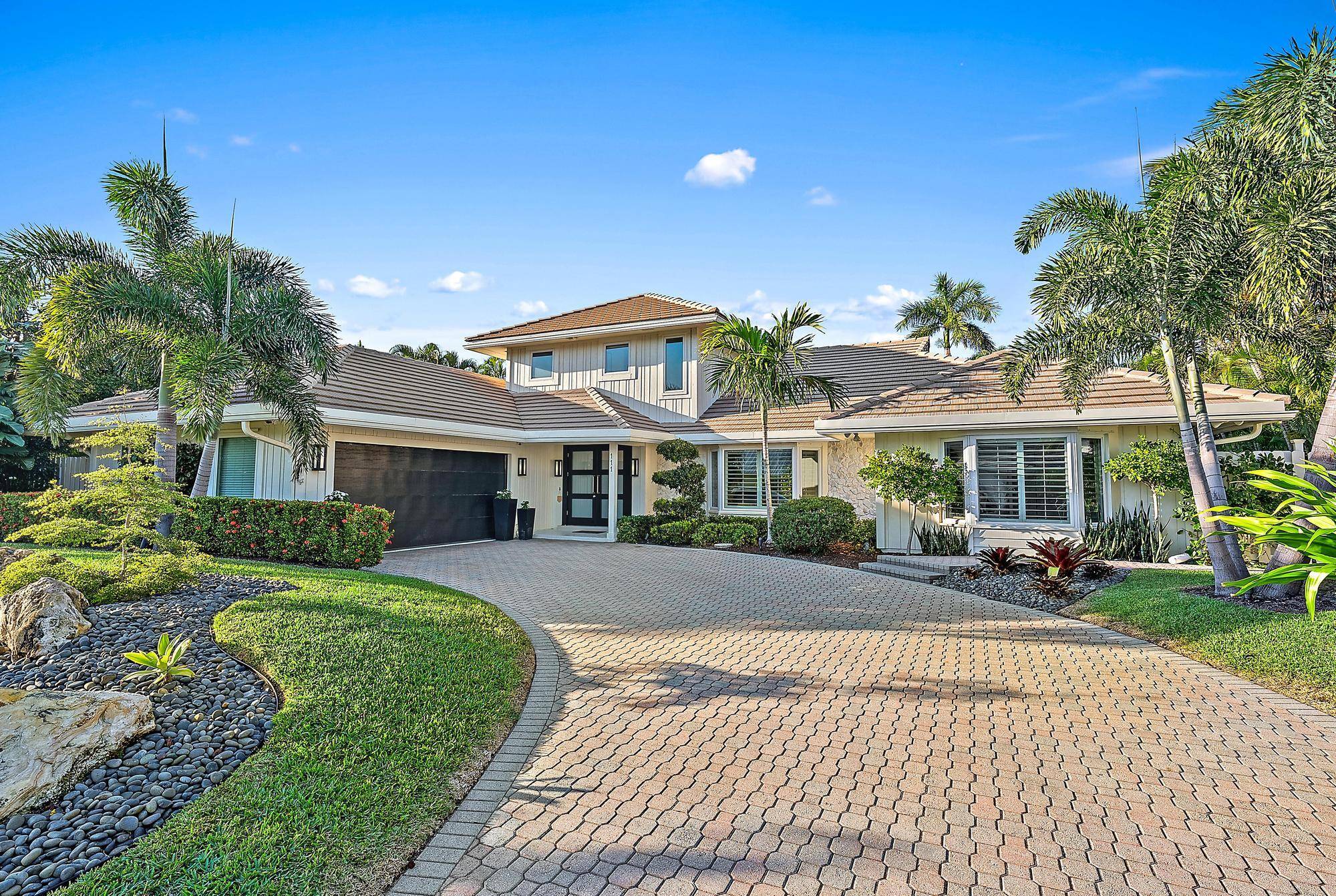 Nestled in the prestigious Olympus neighborhood, this stunning coastal retreat offers the perfect blend of modern elegance and tropical tranquility.