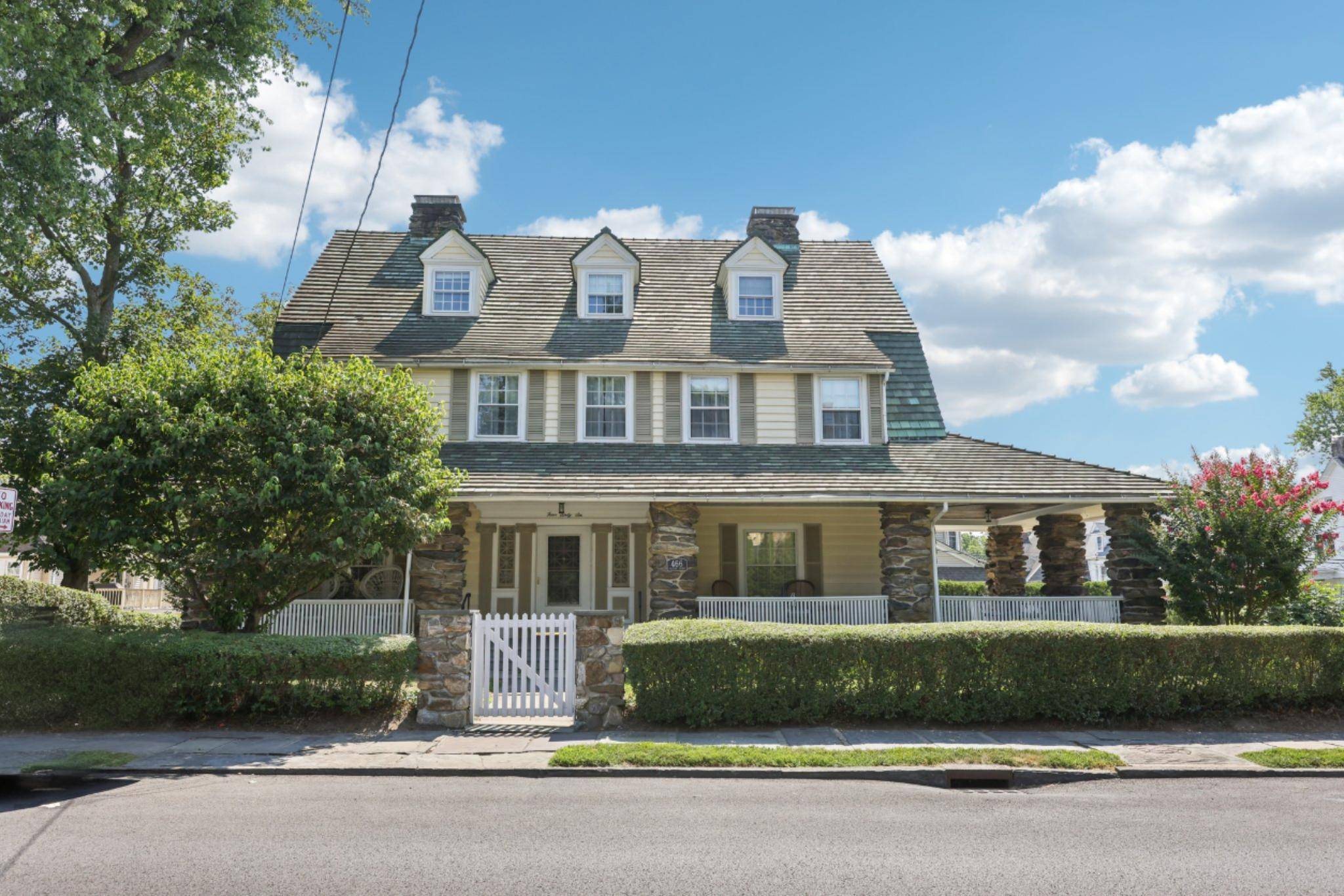 Welcome to this majestic 1910 Colonial, a true architectural gem offering over a century of elegance and charm.