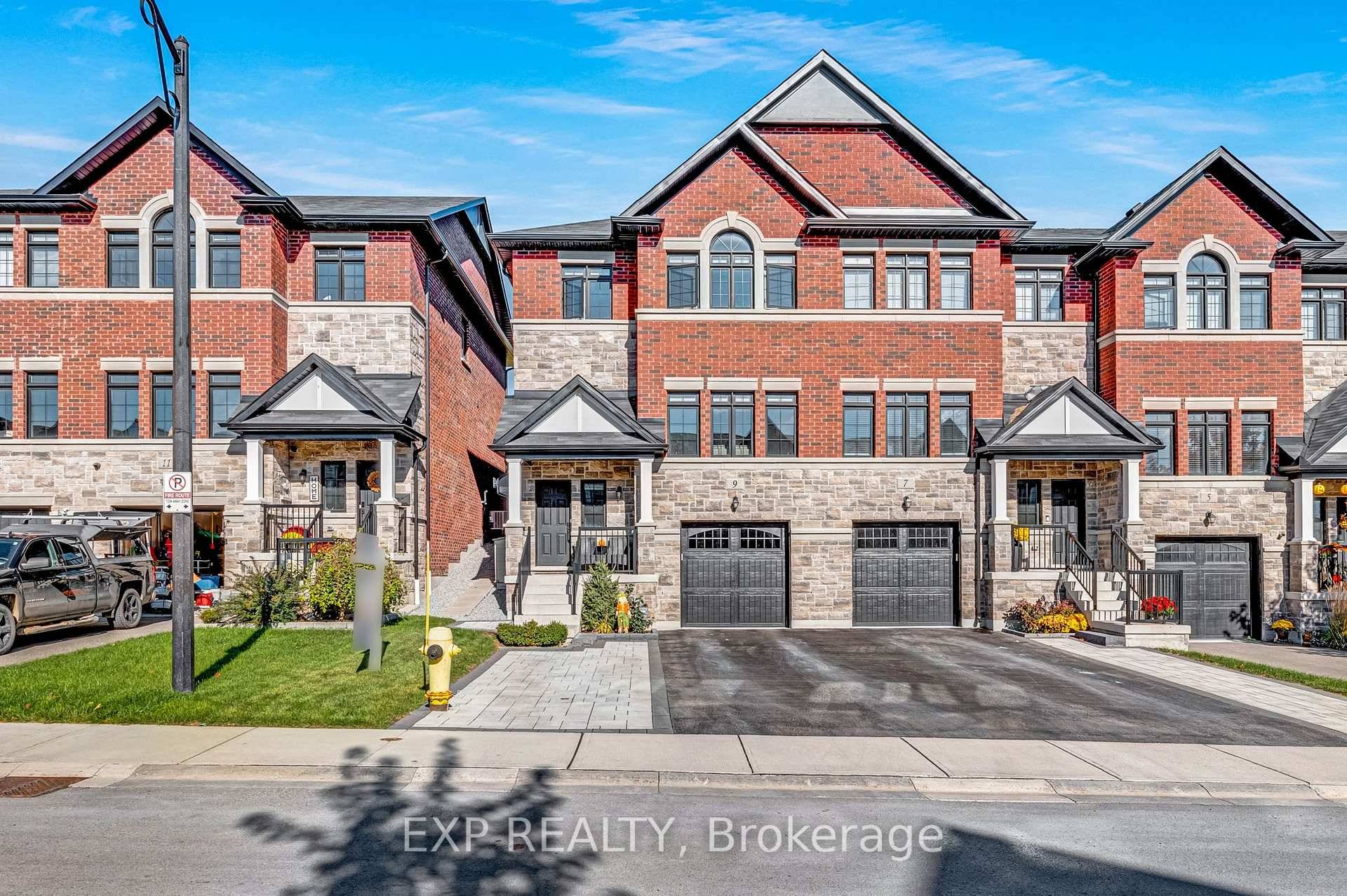 This stunning end unit townhome truly has it all !