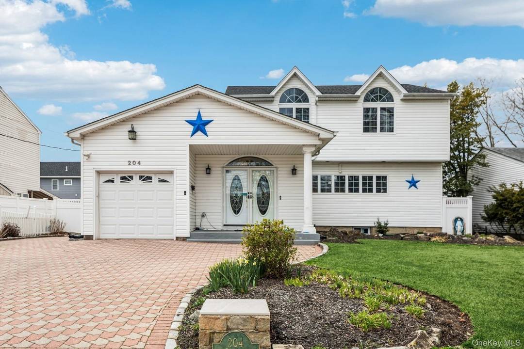 Versatile Mother Daughter Living in Prime Massapequa Park Welcome to 204 Broadway With over 2, 800 square feet of thoughtfully updated living space, this spacious Colonial offers the perfect blend ...