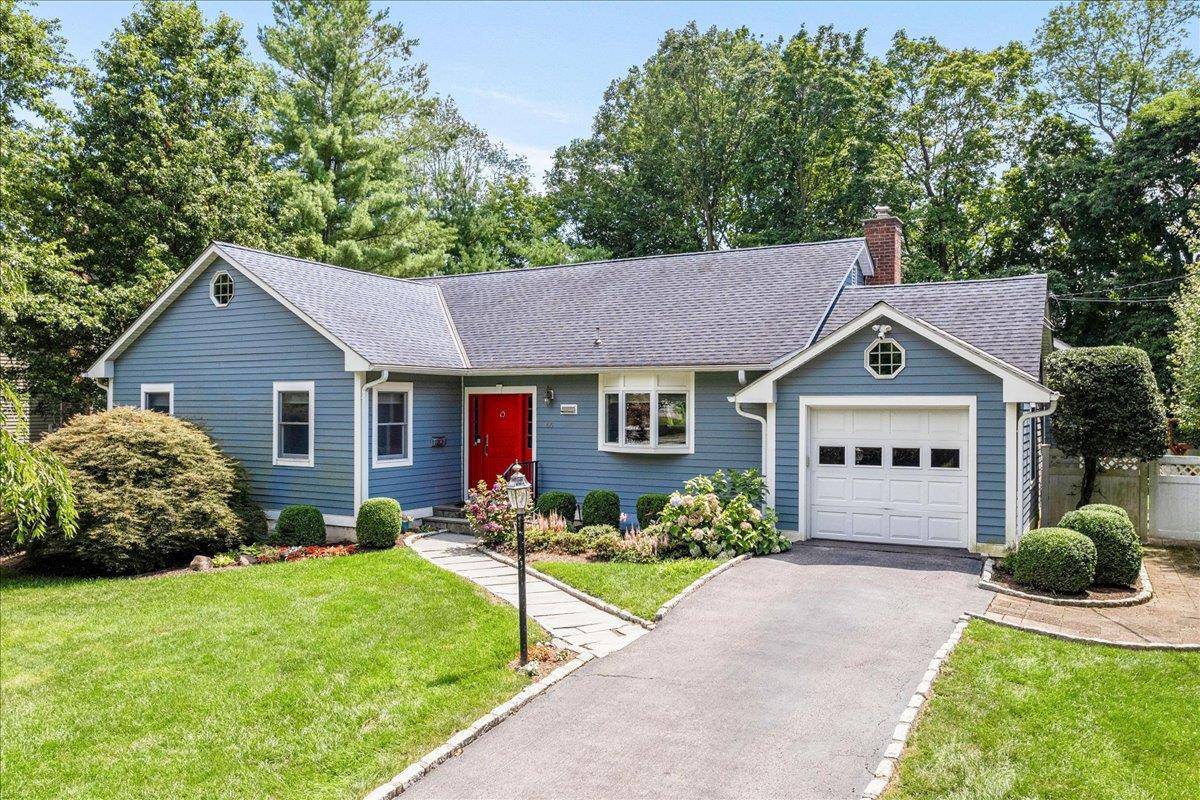Welcome to 65 Winding Wood Road South in the highly desirable Pine Ridge neighborhood of the Blind Brook School District, known for its award winning schools.