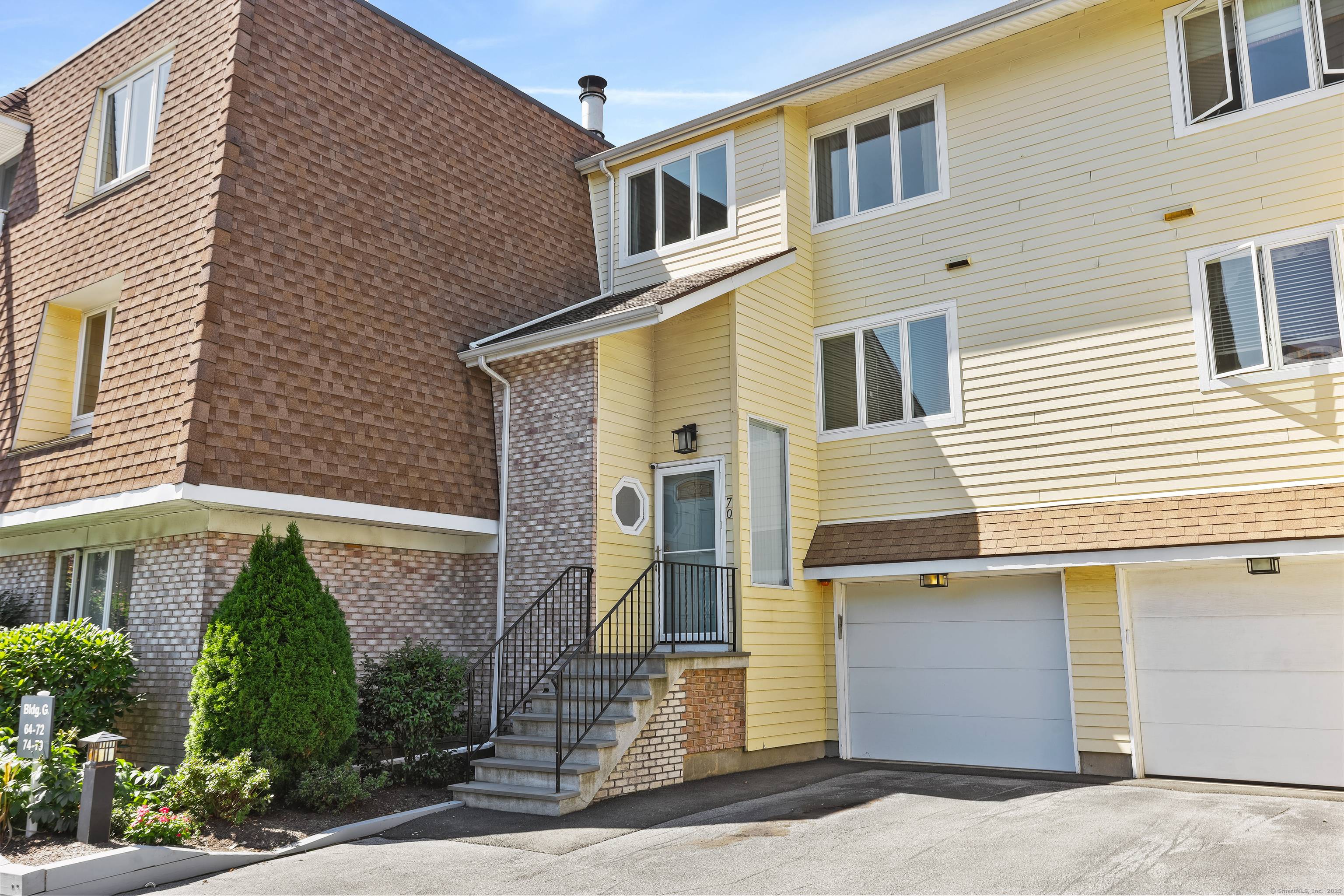 Updated 3 bedroom, 2. 5 bath Shippan Point townhouse with open main level, fireplace, and sliders to a deck overlooking park like grounds.