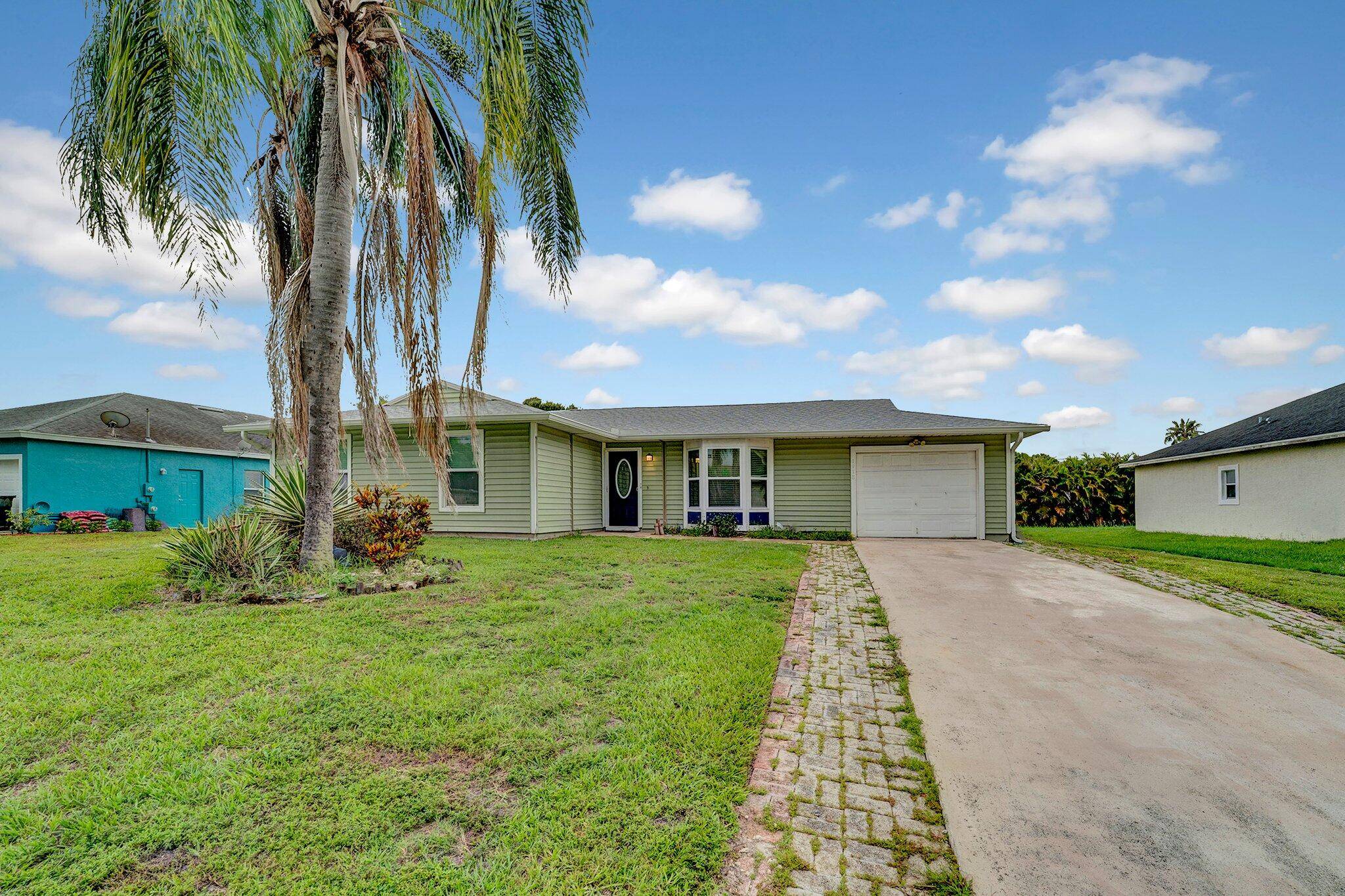 The search is over come fall in LOVE with this 3 bedrooms, 2 bathrooms, flex room and HUGE Florida room with french doors leading to the covered screened in patio ...