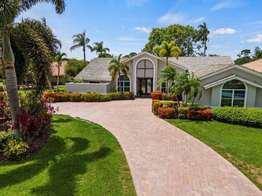 Waterfront... custom CBS home in Country Club Estates !