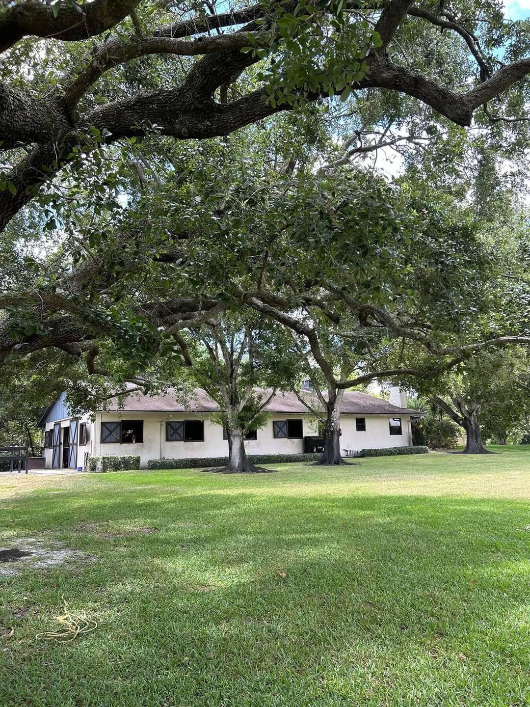 Beautiful, Peaceful 10 acre property with an 8 Stall Barn with spacious tack room.