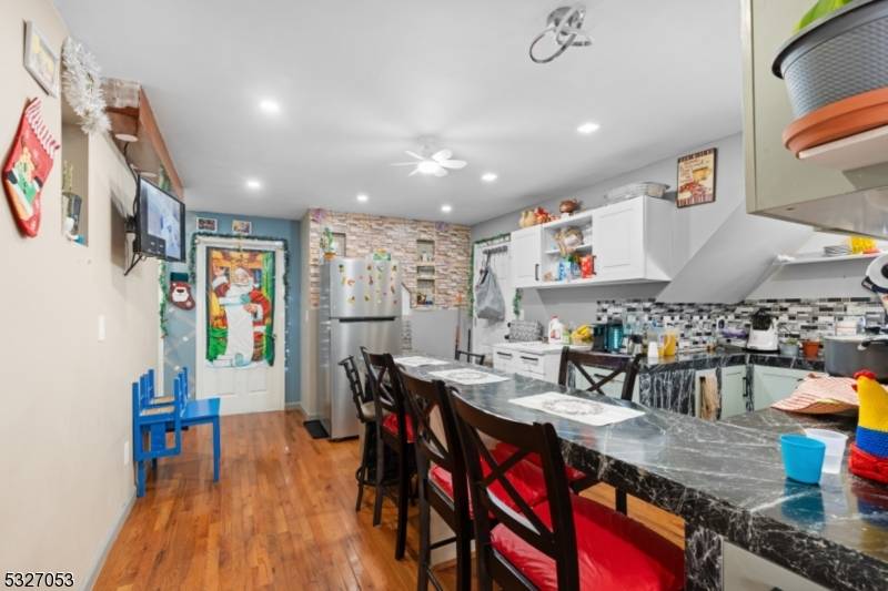Welcome to 311 Elmwood Avenue, a compelling investment opportunity situated in a desirable location.