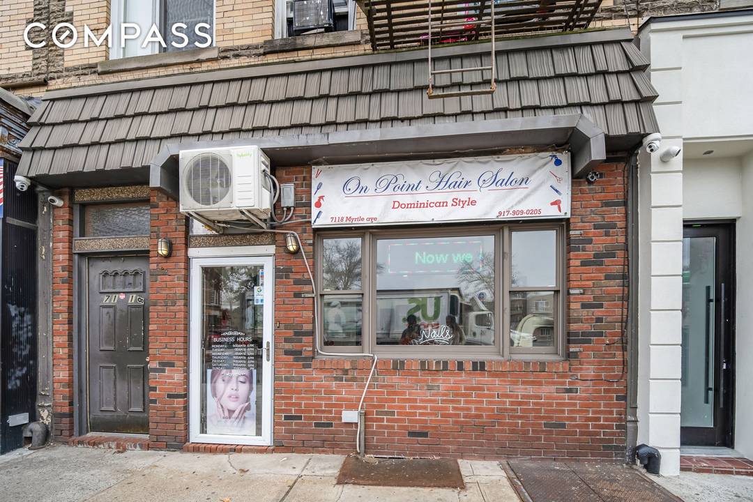 Exceptional investment prospect located at the Ridgewood Glendale border a mixed use building featuring five residential units and a commercial space.