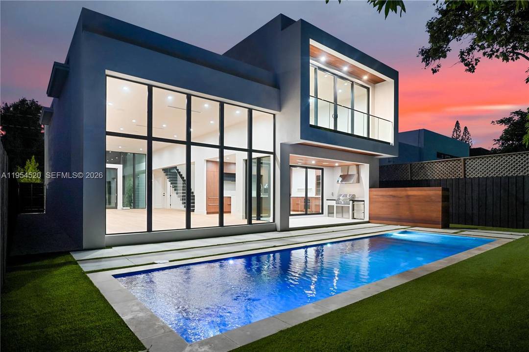 Located just a few blocks from the Miami Design District, this new construction modern residence with 5 bedrooms, 5 full bathrooms and 3, 690 total SqFt.