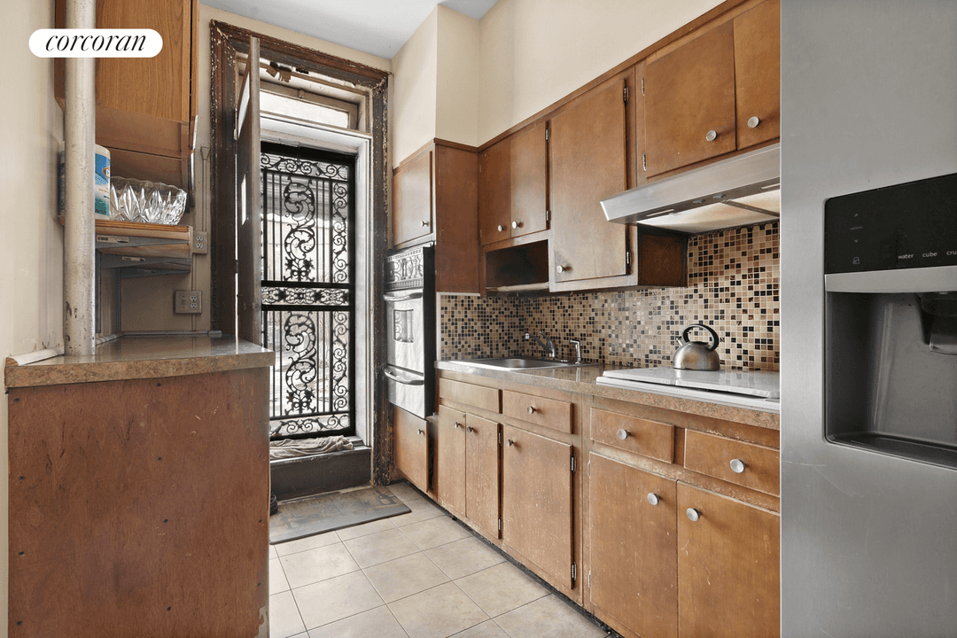 Prime Crown Heights corner mixed use building with 4 car garage located directly across the street from St John's Park providing high cap and or development potential.