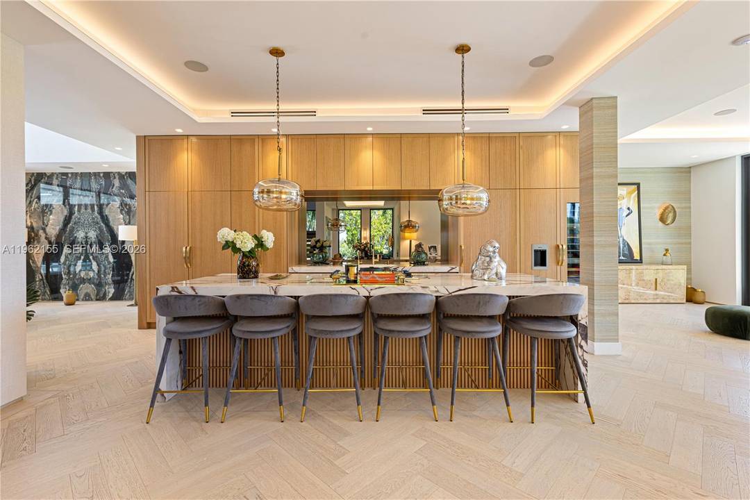 NEW 2024 BUILD LUXURY MODERN DECO ESTATE ON THE ONLY CORNER LOT OVERLOOKING MIAMI BEACH GOLF COURSE DRAPED WITH MIAMI SUNSETS !